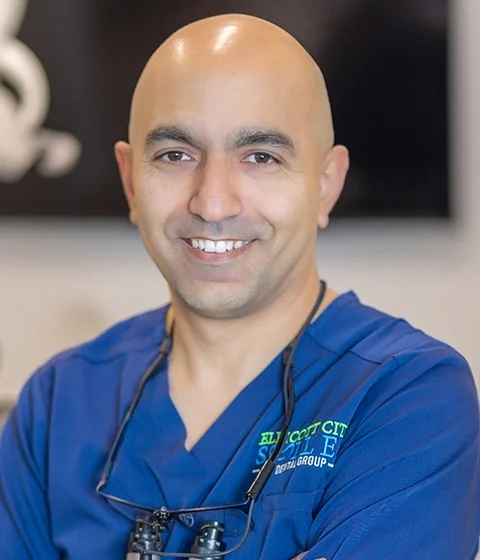 Dr. Alireza (Reza) Modarres, DDS, MS, board-certified periodontist at Ellicott City Smiles.